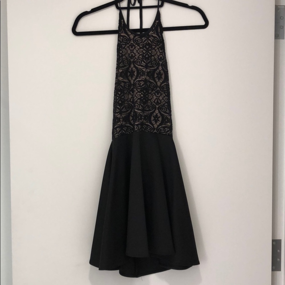 Lace halter dress with open back.